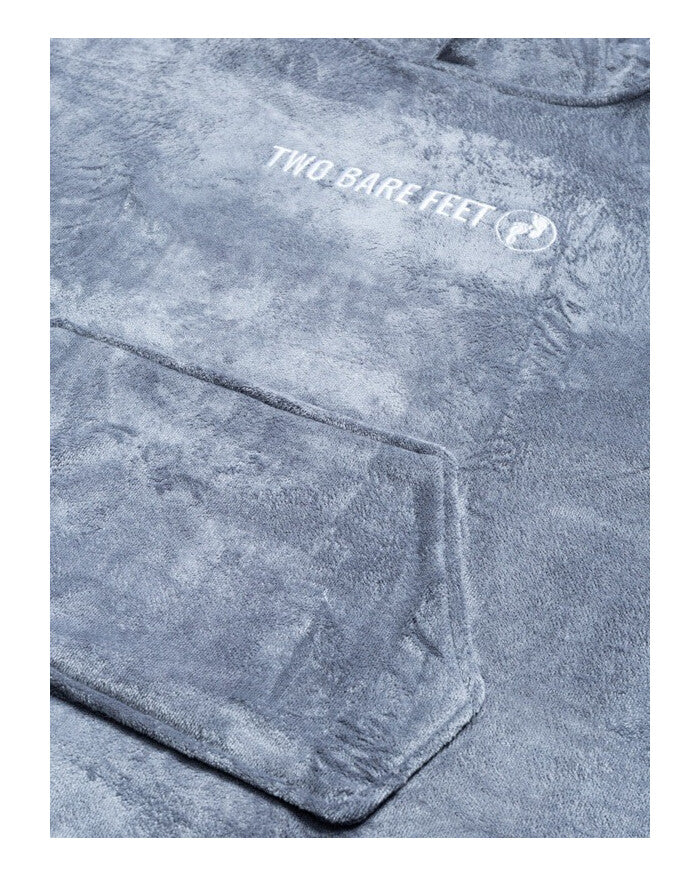 Close-up of grey towel poncho fabric